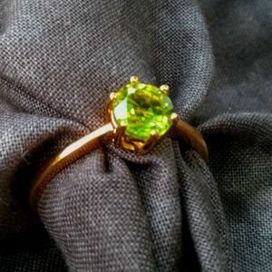 Peridot solitaire ring in gold over Sterling silver